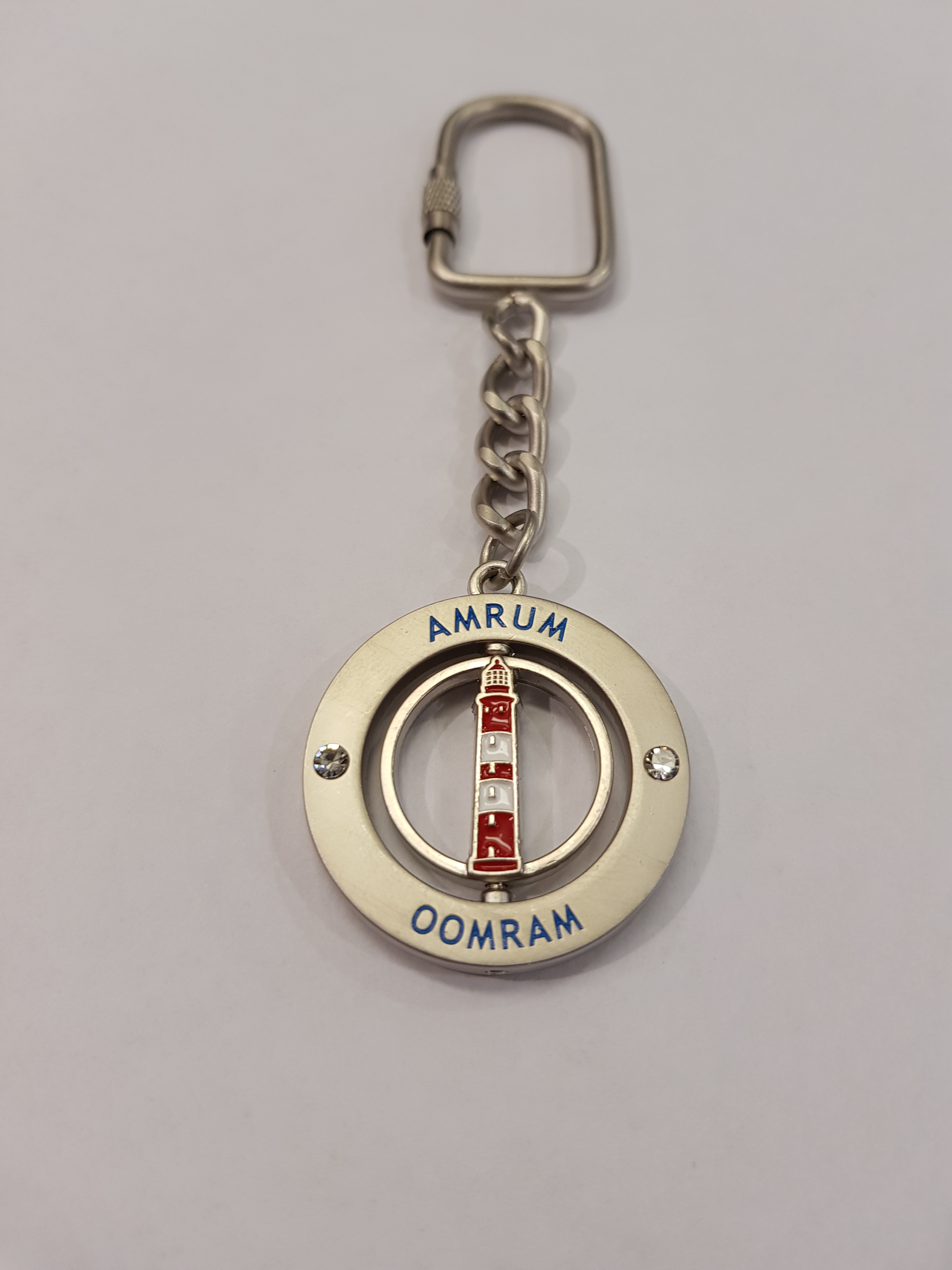 Schlüsselanhänger Amrum/Oomram, rund, Leuchtturm, drehbar
